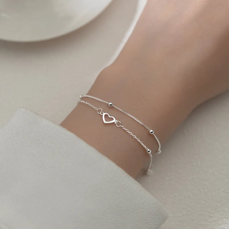 Pulseira Vivence em Prata com Corações