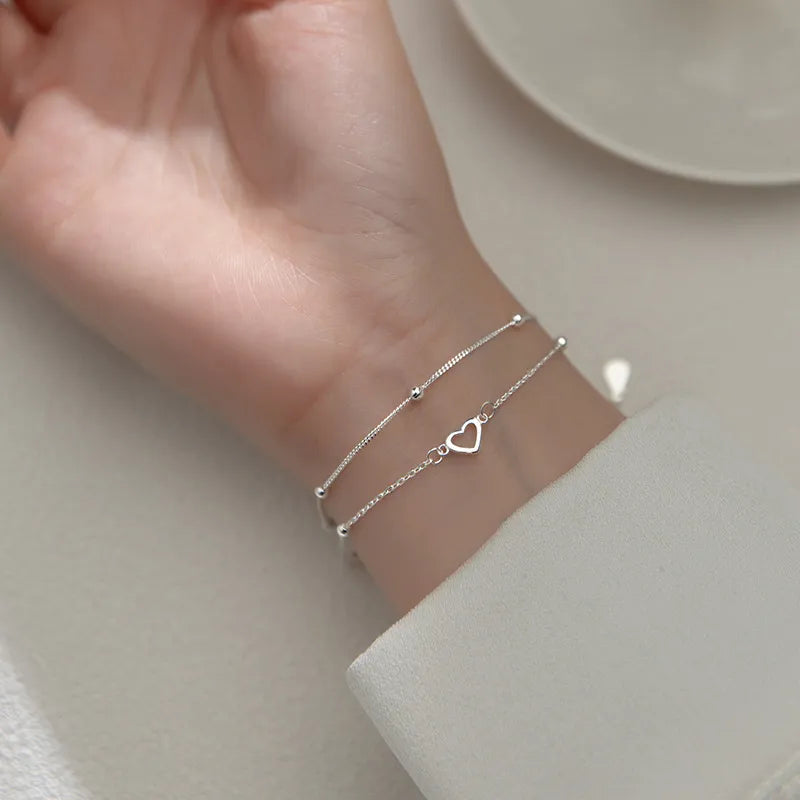 Pulseira Vivence em Prata com Corações