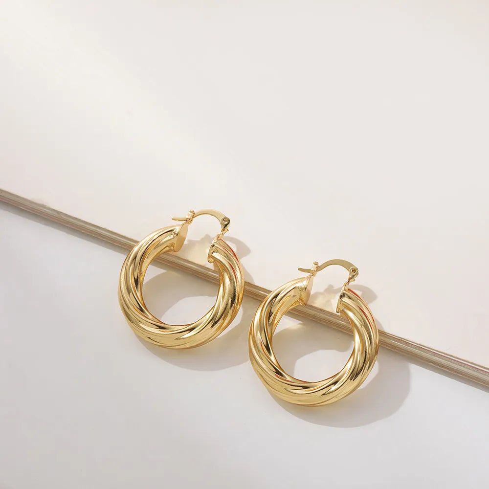Brinco de Argola Torcido Banhado a Ouro 18k